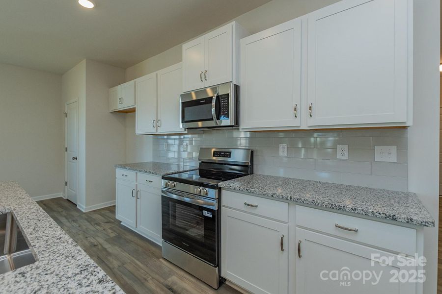 Furnished interior view inside a new home in Country Club Village, Salisbury (Image 9).