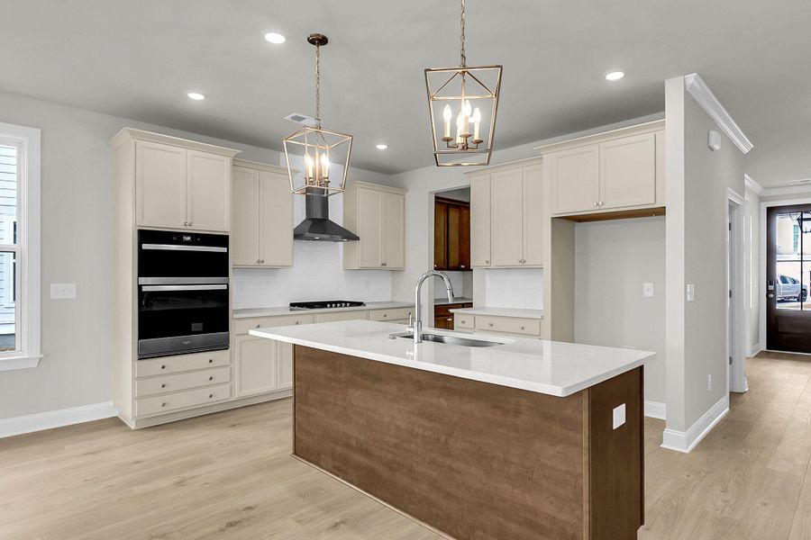 Furnished interior view inside a new home in Tidewater at Lakes of Cane Bay, Summerville (Image 7).