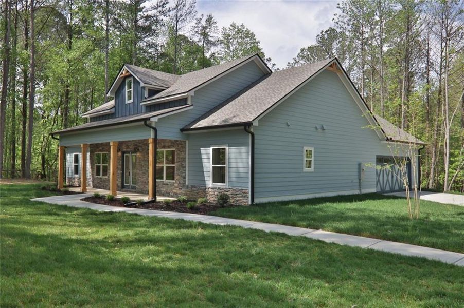 Front exterior of a new home in , Dallas, GA, highlighting curb appeal (Image 23). Front exterior of a new home in , Dallas, GA, highlighting curb appeal (Image 23).
