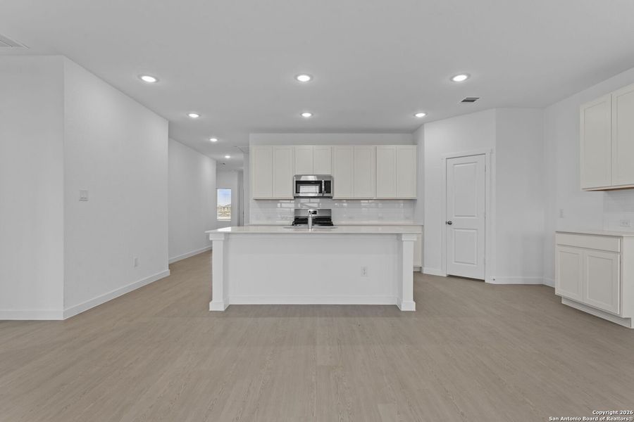 Furnished interior view inside a new home in Voss Farms, New Braunfels (Image 5).