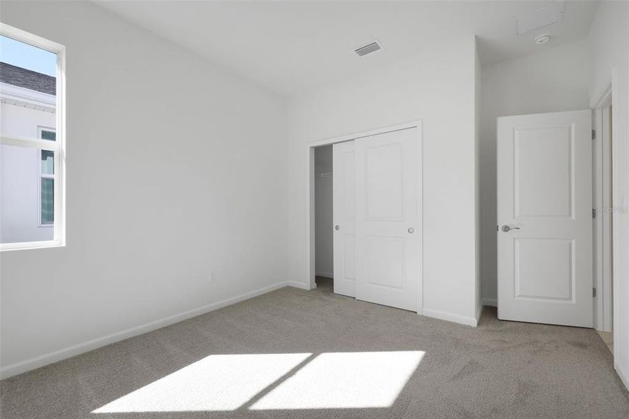 Spacious, unfurnished interior of a new home in Brystol North at Wylder, Port St. Lucie (Image 12).