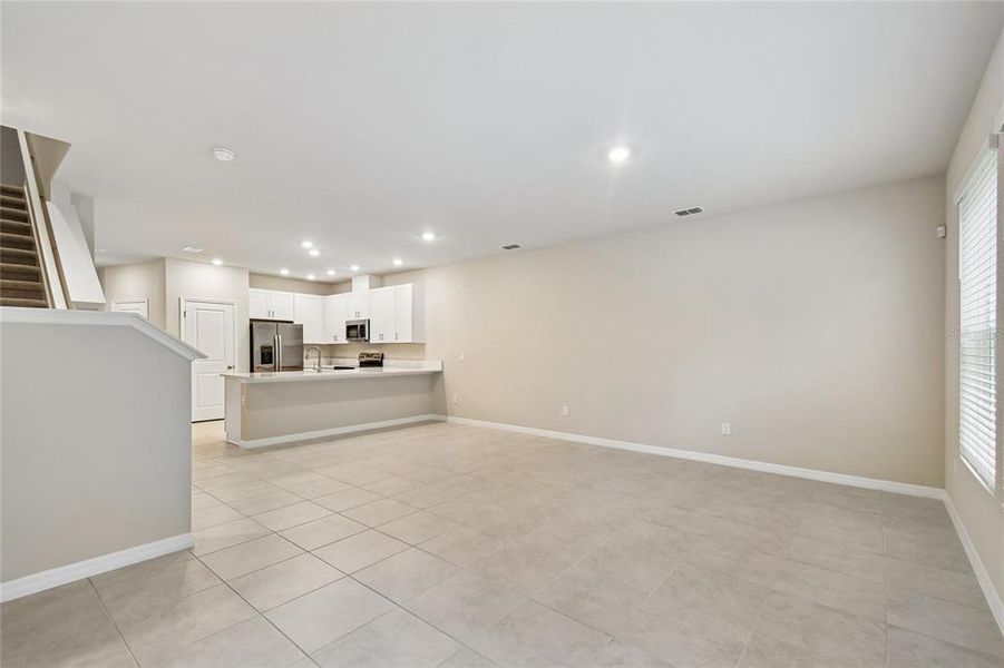 Spacious, unfurnished interior of a new home in Preserve at The Cays – The Harbor Series, Daytona Beach (Image 19). Spacious, unfurnished interior of a new home in Preserve at The Cays – The Harbor Series, Daytona Beach (Image 19).