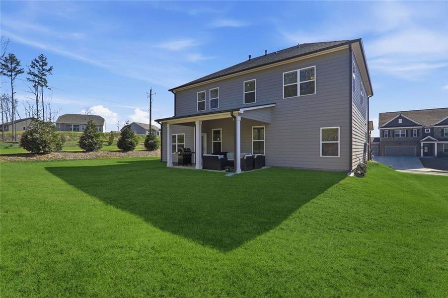 Exterior details and patio area of a home in Rosewood Lake Estates, Hoschton (Image 37). Exterior details and patio area of a home in Rosewood Lake Estates, Hoschton (Image 37).