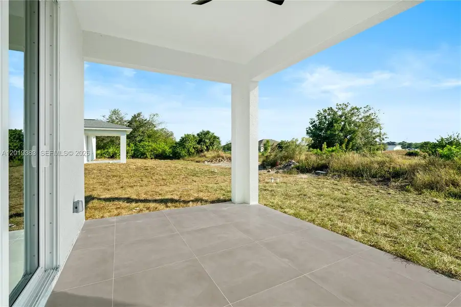 Exterior details and patio area of a home in , Lehigh Acres (Image 2). Exterior details and patio area of a home in , Lehigh Acres (Image 2).