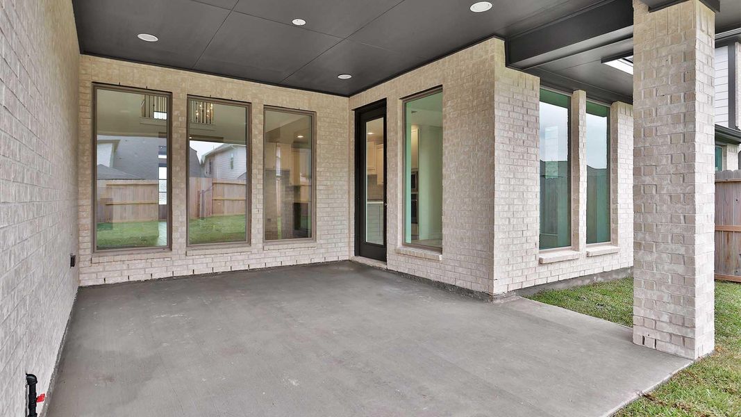 Exterior details and patio area of a home in Sienna, Missouri City (Image 3). Exterior details and patio area of a home in Sienna, Missouri City (Image 3).