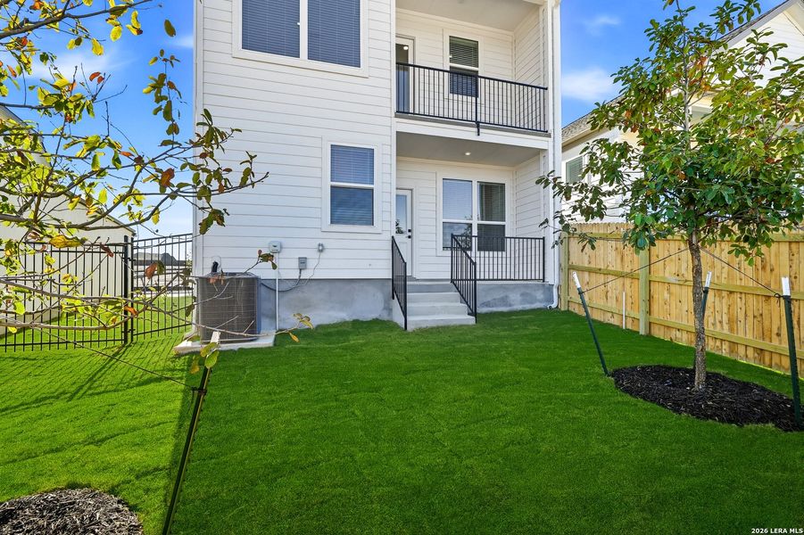 Exterior details and patio area of a home in Prominence, San Antonio (Image 25).