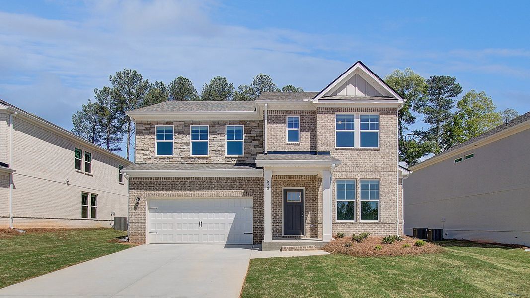 Representative exterior photo of a completed home built from the Ridgewood by DRB Homes in Bowers Farm, McDonough, GA (Image 23).