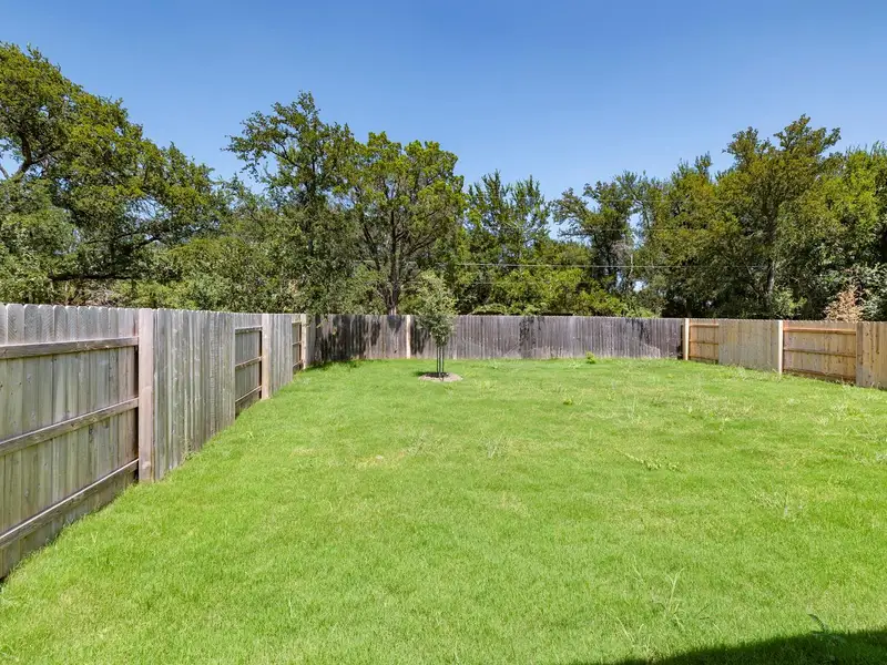 Exterior details and patio area of a home in Orchard Ridge, Liberty Hill (Image 19).