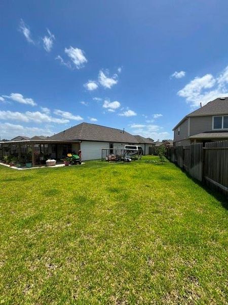 Exterior details and patio area of a home in Granger Pines, Conroe (Image 23).