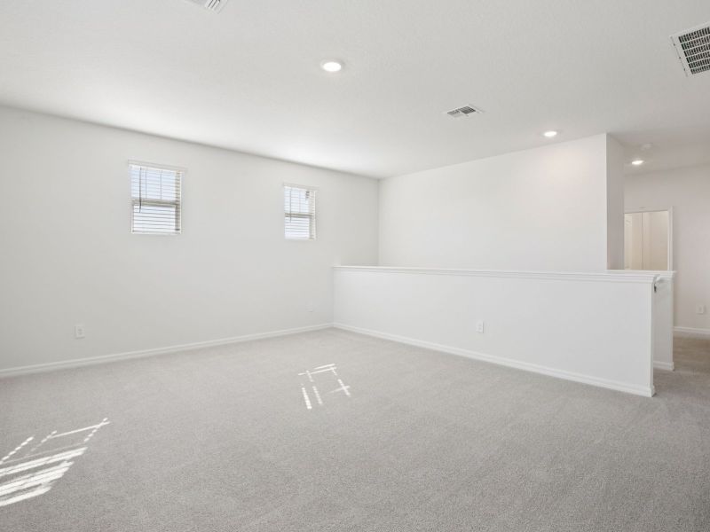 Spacious, unfurnished interior of a new home in Coasterra - Reserve Series, Palmetto (Image 14).