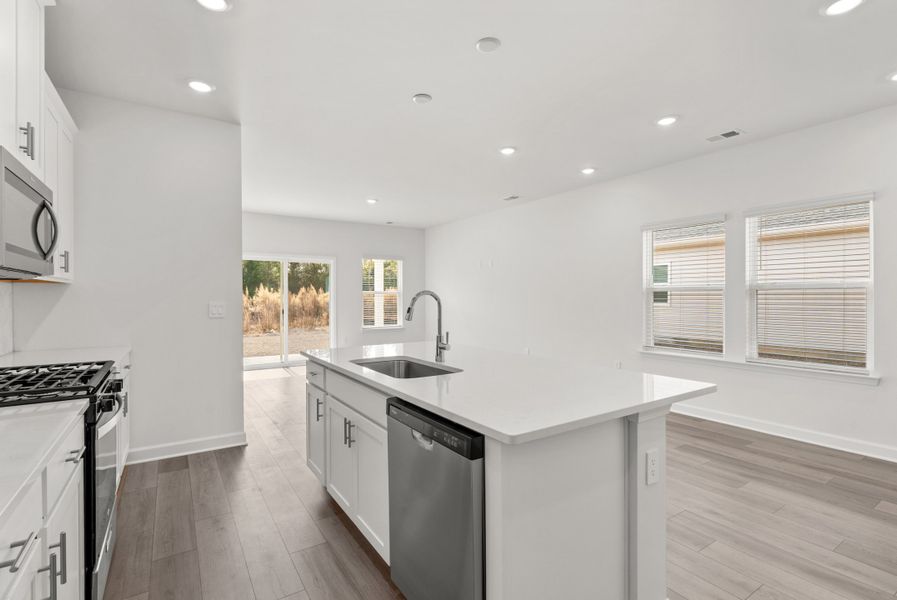 Furnished interior view inside a new home in Cypress Ridge - The Boardwalk Series, Longs (Image 9).
