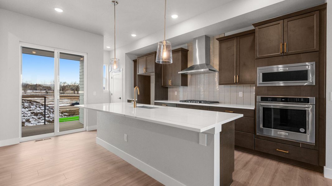 Furnished interior view inside a new home in Dillon Pointe - Skyview, Broomfield (Image 3).