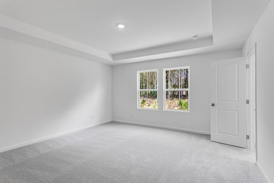 Representative unfurnished interior of a home built from the Avera by Taylor Morrison in Falls Creek, Flowery Branch (Image 13).