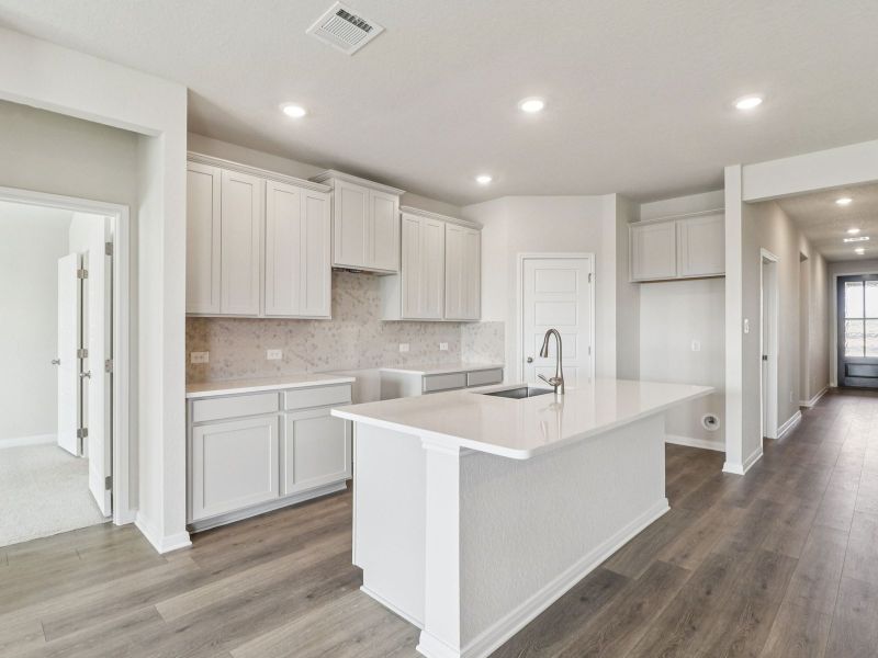 Kitchen in the Callaghan floorplan at a Meritage Homes community.