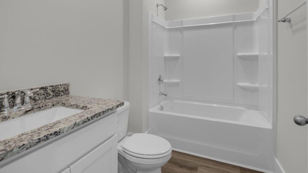 Furnished interior view inside a new home in Surfside Landing, Hubert (Image 13).