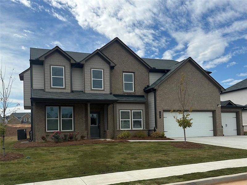 Front exterior of a new home in , Auburn, GA, highlighting curb appeal (Image 18). Front exterior of a new home in , Auburn, GA, highlighting curb appeal (Image 18).
