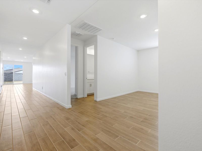 Spacious, unfurnished interior of a new home in White Tank Foothills Signature Series, Waddell (Image 11).