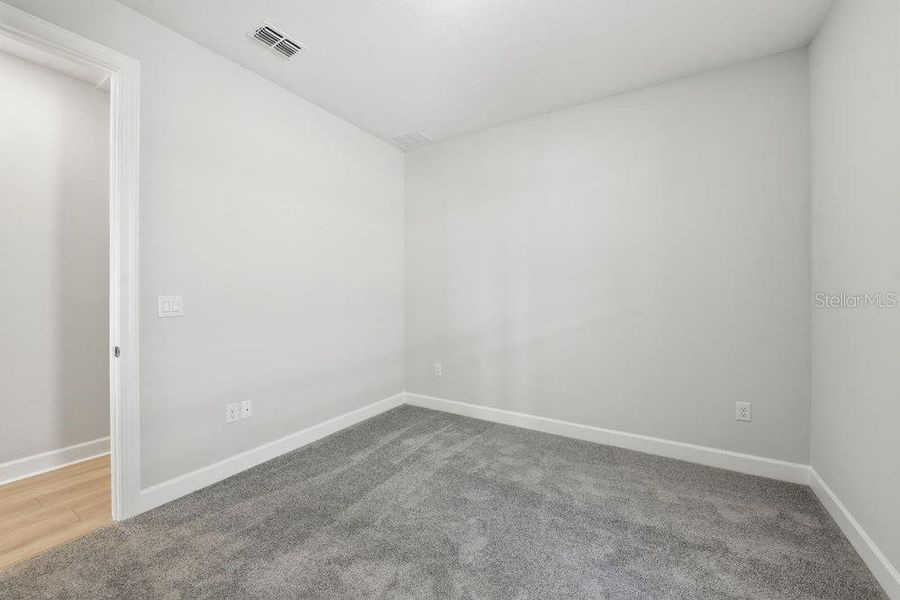 Spacious, unfurnished interior of a new home in Coasterra Community Group Page, Palmetto (Image 13).