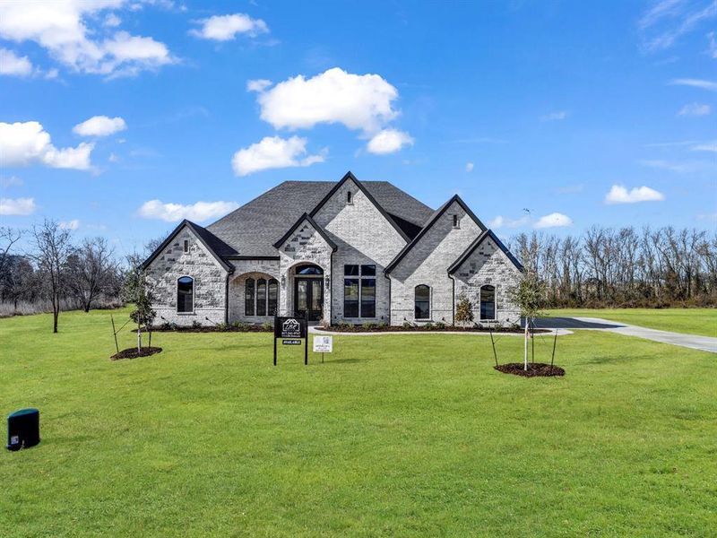 Front exterior of a new home in , Weatherford, TX, highlighting curb appeal (Image 27).
