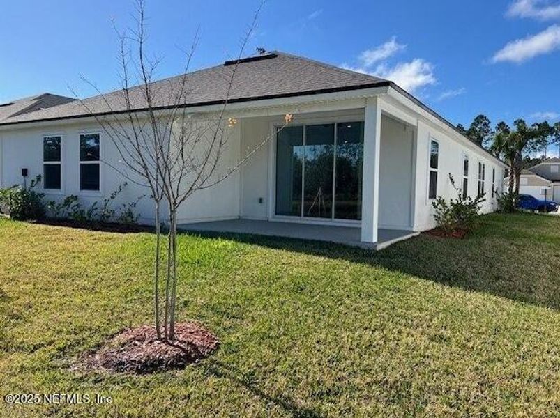 Exterior details and patio area of a home in Sawmill Branch, Palm Coast (Image 3).