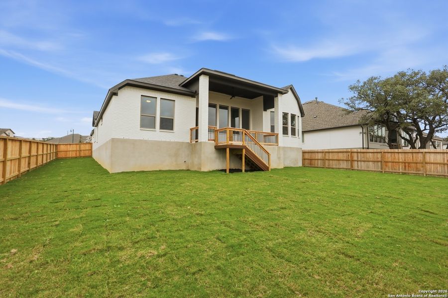 Exterior details and patio area of a home in Kinder Ranch - 70', San Antonio (Image 26).