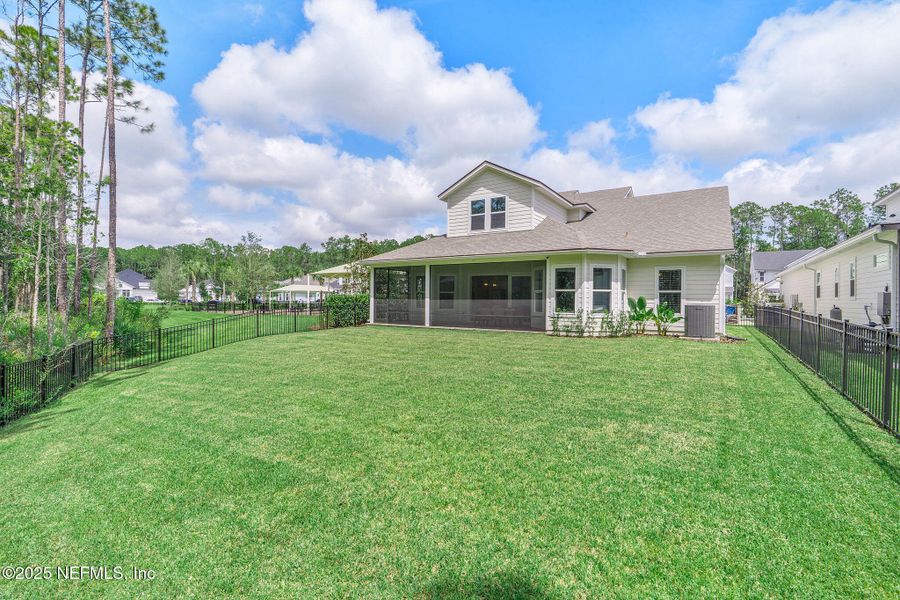 Front exterior of a new home in Palm Crest AT Seabrook, Ponte Vedra, FL, highlighting curb appeal (Image 23).