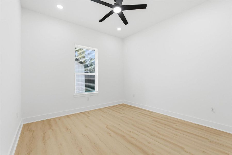 A junior suite is located at the front of the home, offering the perfect private retreat for guests.