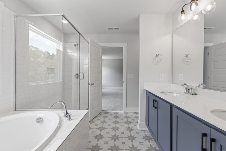 Representative furnished interior of a home built from the Blue Satin Sashes by Garman Homes in Spring Valley, Trinity (Image 6).