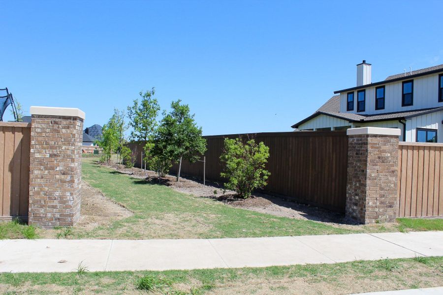 Exterior details and patio area of a home in , College Station (Image 8).
