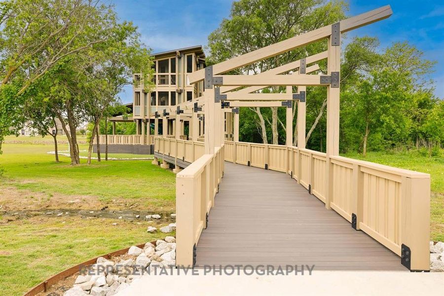 Deck featuring a lawn