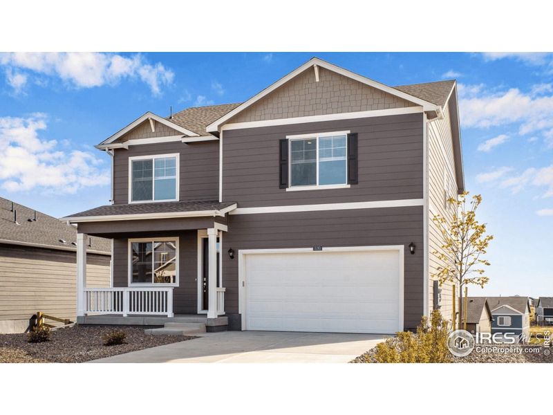 Front exterior of a new home in Westgate, Greeley, CO, highlighting curb appeal (Image 2).