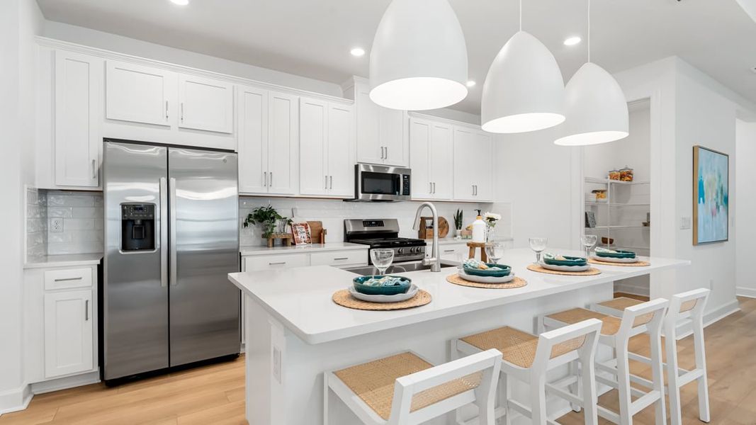 Furnished interior view inside a new home in Coasterra Community Group Page, Palmetto (Image 5).