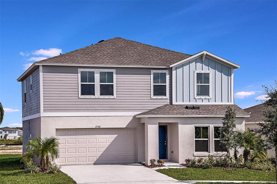 Front exterior of a new home in Scenic Terrace, Haines City, FL, highlighting curb appeal (Image 1).