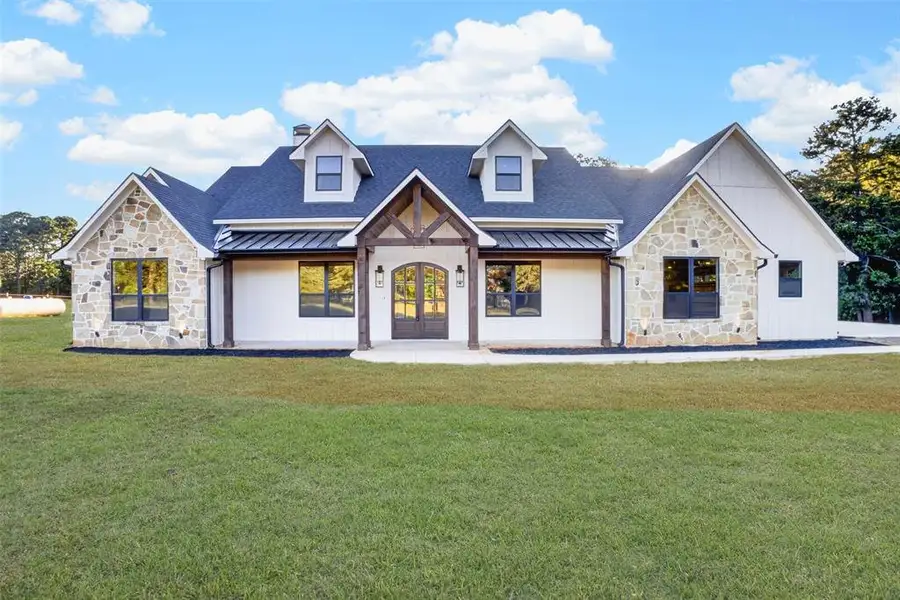 Front exterior of a new home in , Longview, TX, highlighting curb appeal (Image 1). Front exterior of a new home in , Longview, TX, highlighting curb appeal (Image 1).