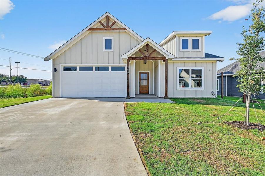 Front exterior of a new home in , Sherman, TX, highlighting curb appeal (Image 1).