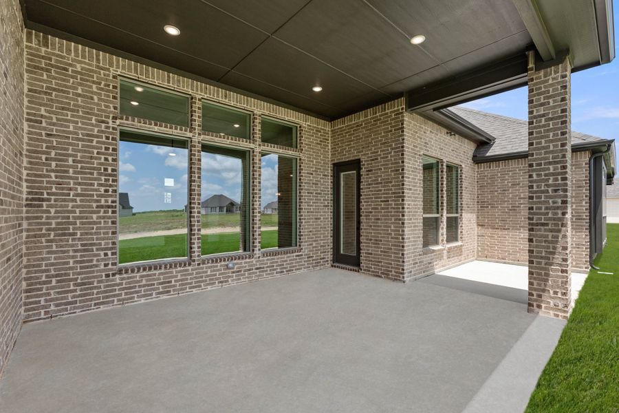 Exterior details and patio area of a home in Pecan Acres, Red Oak (Image 3). Exterior details and patio area of a home in Pecan Acres, Red Oak (Image 3).