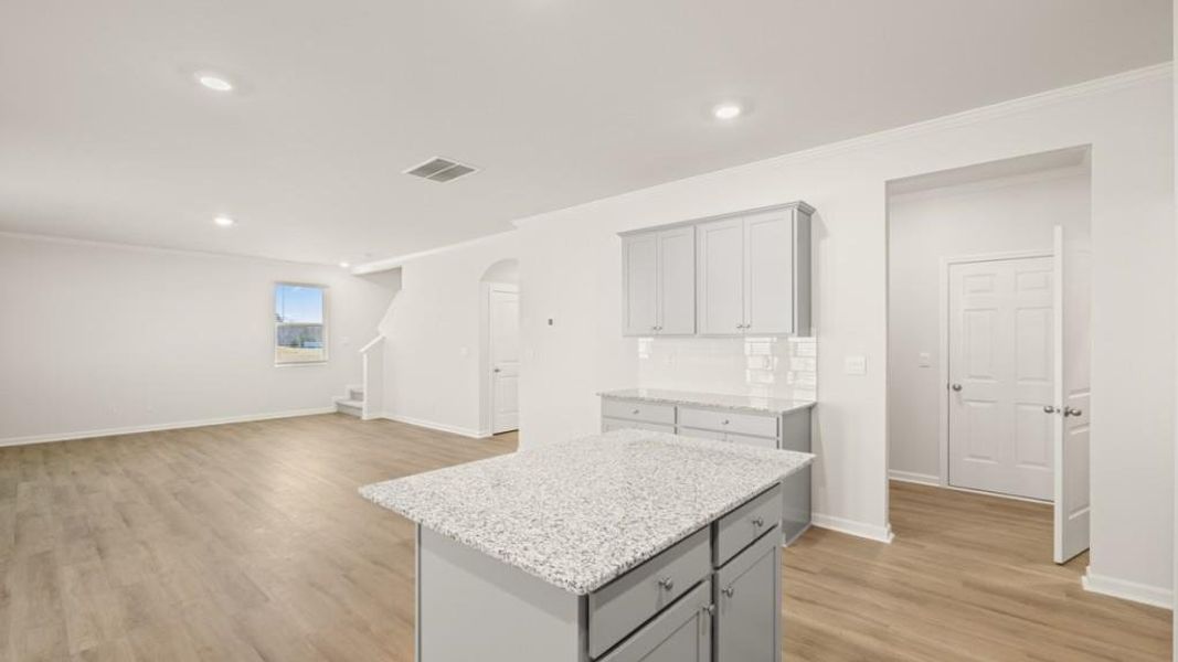 Furnished interior view inside a new home in Northwoods at Mirror Lake, Villa Rica (Image 5).