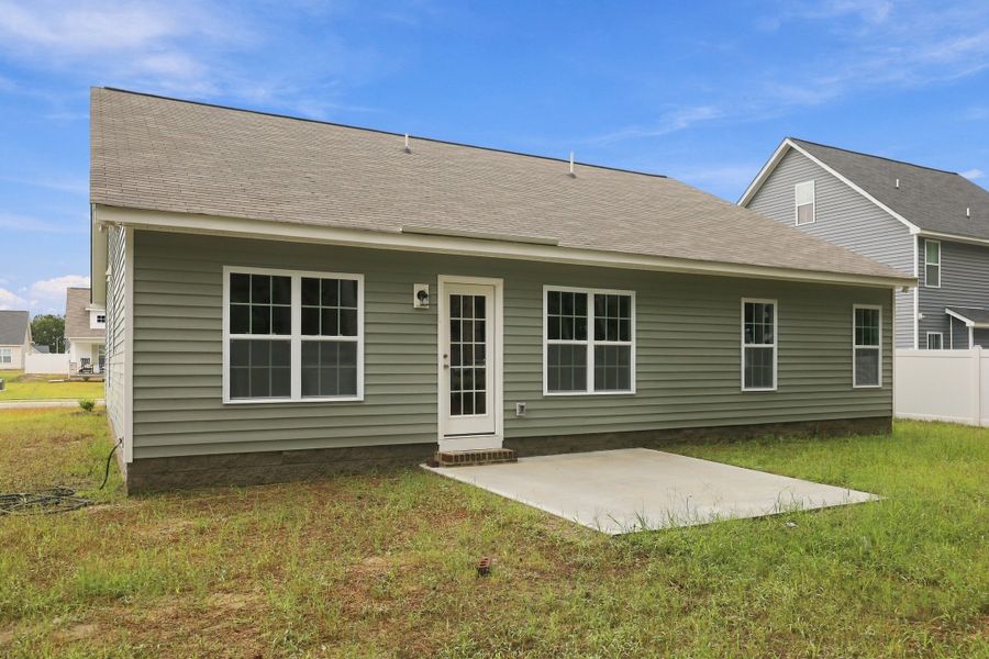Exterior details and patio area of a home in Davenport Farms, Winterville (Image 21).