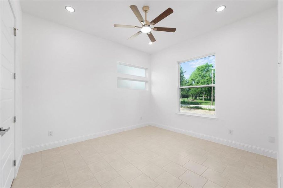 Unfurnished room featuring recessed lighting and ceiling fan Unfurnished room featuring recessed lighting and ceiling fan