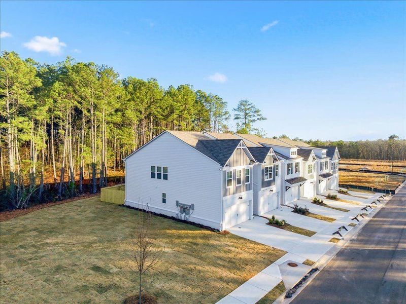 Front exterior of a new home in , Conyers, GA, highlighting curb appeal (Image 1). Front exterior of a new home in , Conyers, GA, highlighting curb appeal (Image 1).