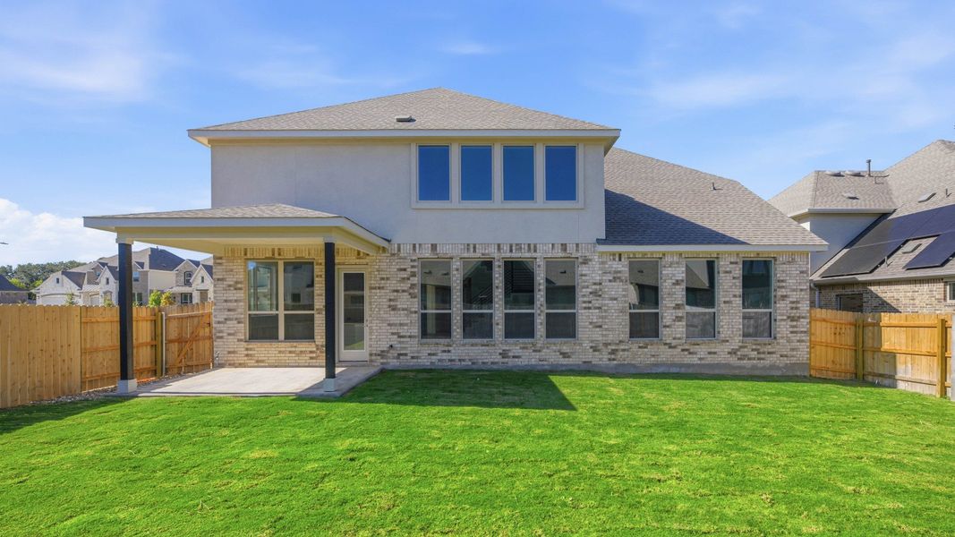 Exterior details and patio area of a home in Hawkes Landing, Leander (Image 3).