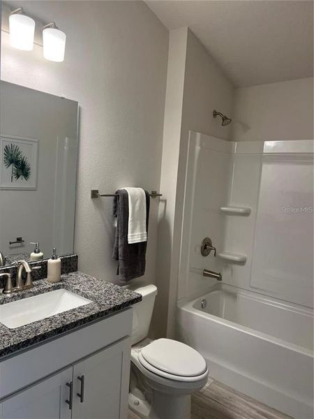 Furnished interior view inside a new home in Abbey Glen, Dade City (Image 3).