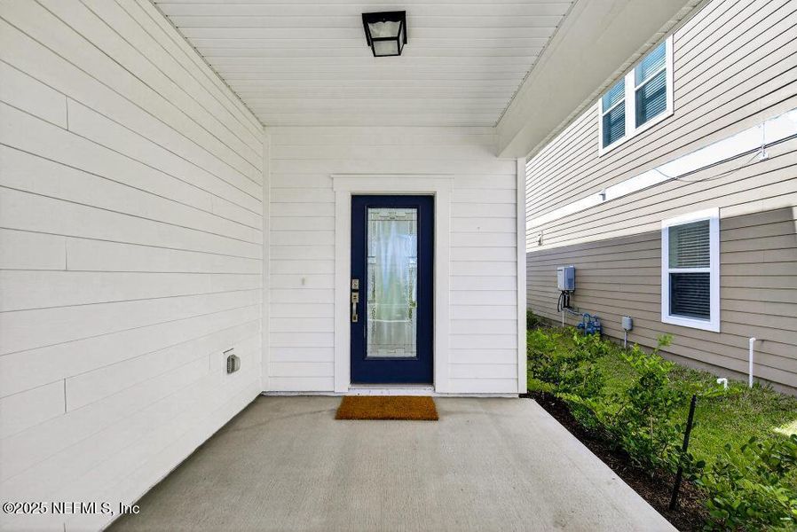 Exterior details and patio area of a home in Silver Landing at SilverLeaf, St. Augustine (Image 29).