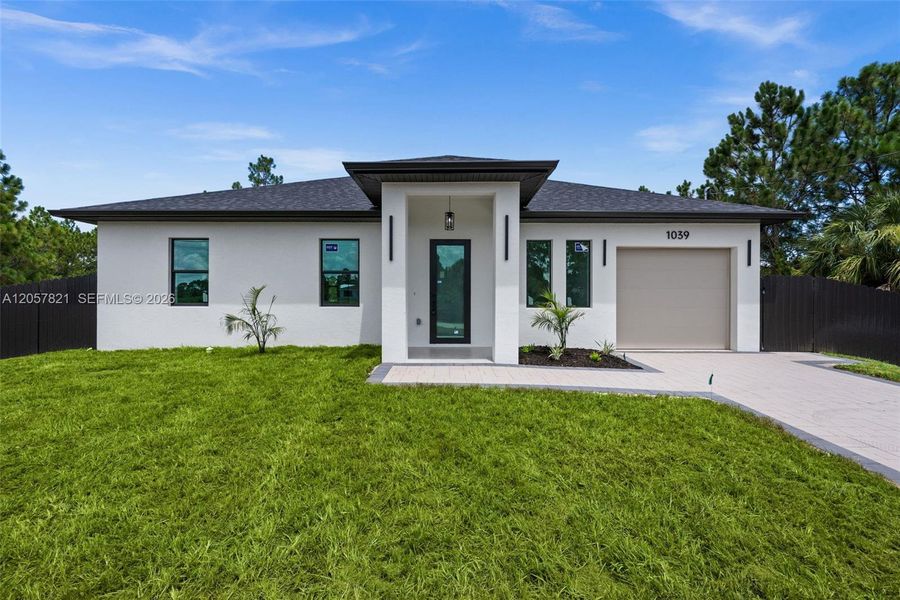 Exterior details and patio area of a home in , Lehigh Acres (Image 3). Exterior details and patio area of a home in , Lehigh Acres (Image 3).