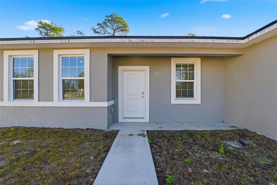 Exterior details and patio area of a home in , Ocala (Image 3).