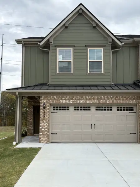 Front exterior of a new home in Talia Trace, Smyrna, TN, highlighting curb appeal (Image 1). Front exterior of a new home in Talia Trace, Smyrna, TN, highlighting curb appeal (Image 1).