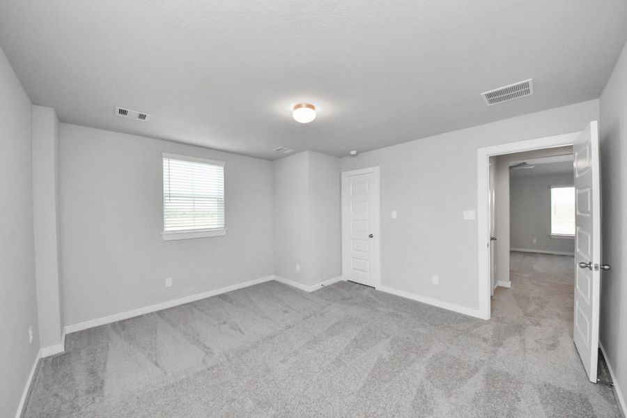 Generously sized secondary bedrooms featuring spacious closets, soft and inviting carpeting underfoot, large windows allowing plenty of natural light, and the added touch of privacy blinds for your personal retreat. Generously sized secondary bedrooms featuring spacious closets, soft and inviting carpeting underfoot, large windows allowing plenty of natural light, and the added touch of privacy blinds for your personal retreat.