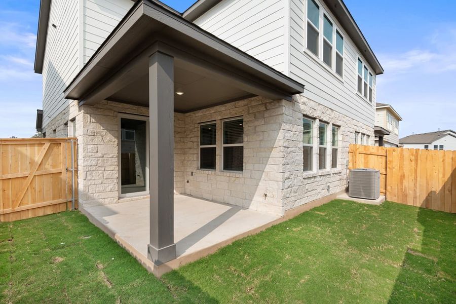 Exterior details and patio area of a home in Union Collection at Park Central, Georgetown (Image 30).