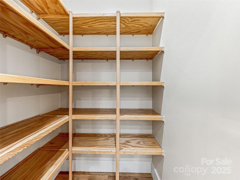 Pantry with wood shelving Pantry with wood shelving