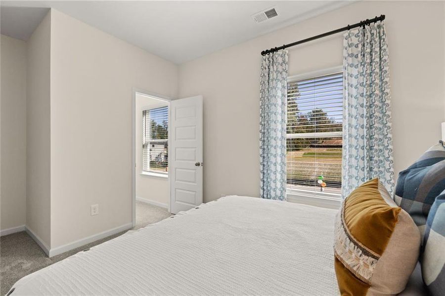 Furnished interior view inside a new home in Summerfield Place, Carrollton (Image 48). Furnished interior view inside a new home in Summerfield Place, Carrollton (Image 48).